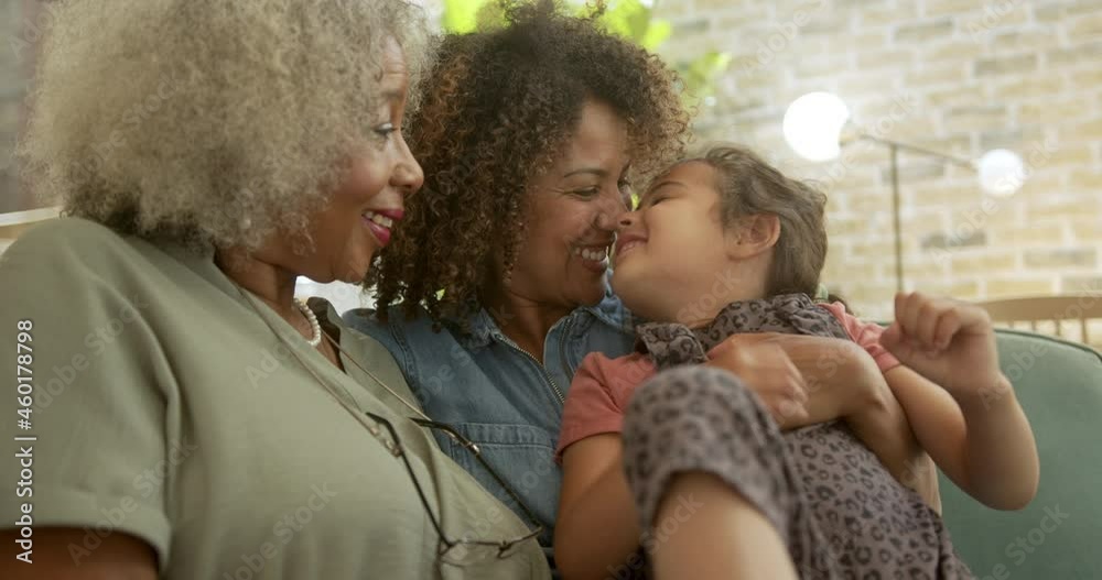 Close up of three generations of women from the same family