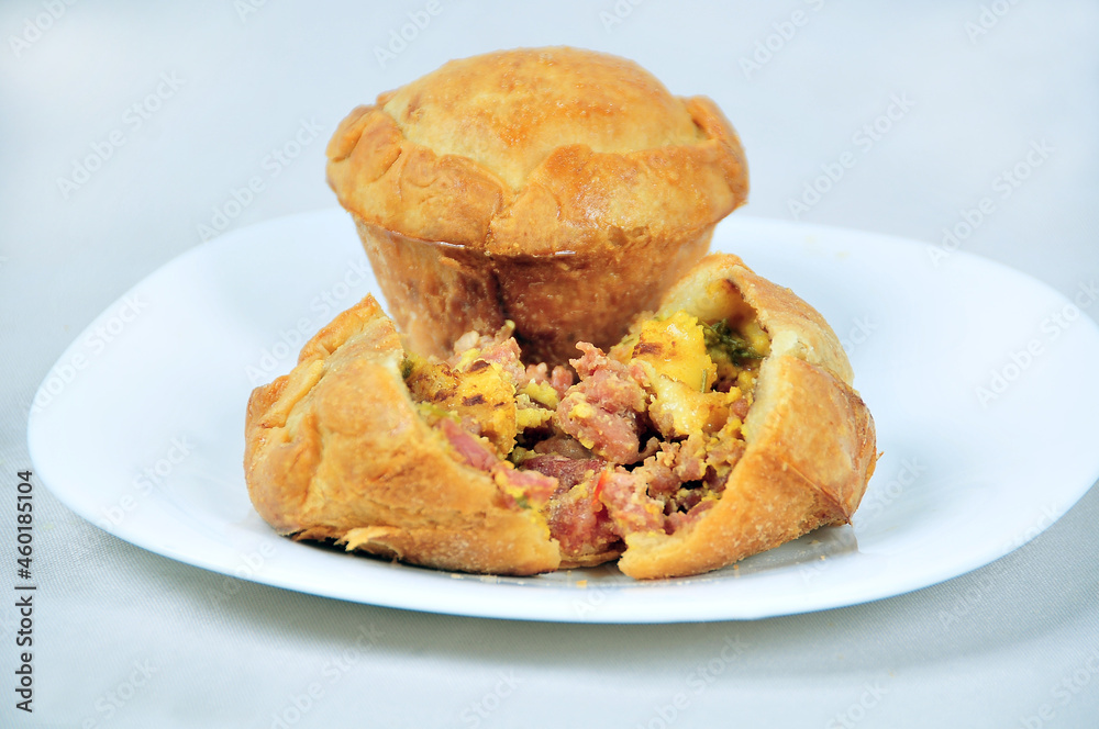 delicious chicken pie, typical of Brazilian cuisine, baked and stuffed with chicken, potato, cheese, olive and cream delicious chicken pie, typical of Brazilian cuisine, baked and stuffed with chicken, potato, cheese, olive and cream