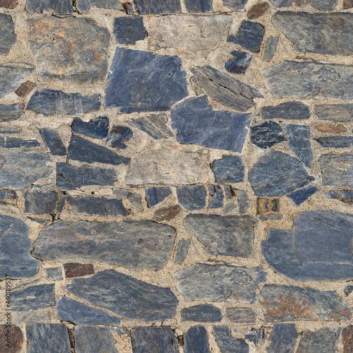 Medieval Stone Pathway. Stone pavement texture. Abstract background of cobblestone pavement close-up. Seamless texture.