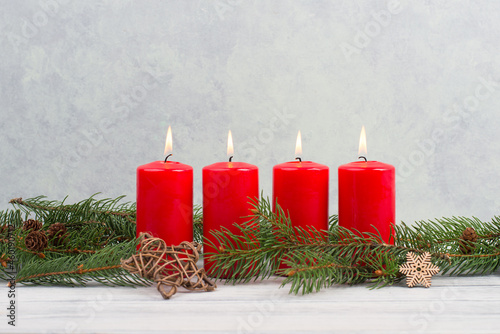 Red candles on a advent wreath, christmas decoration with candlelight