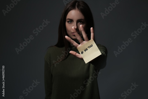 Note paper with hashtag MeT...