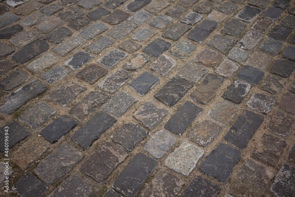 A brick road . old pavement A brick road . old pavement