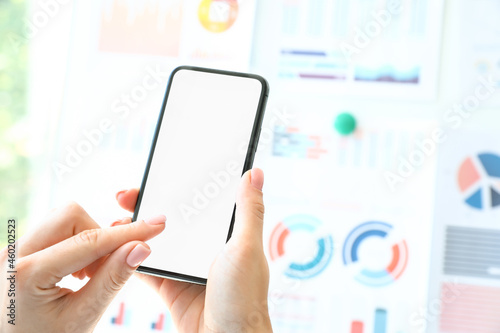 Businesswoman using mobile ...