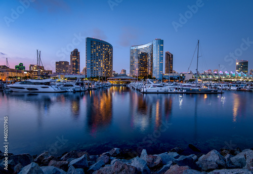 Beautiful twilight mood at the San Diego Marina, with yachts and the Marriott Marquis hotel reflected in the water photo