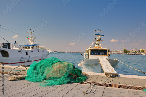 Fishing boats and nets in the harbor