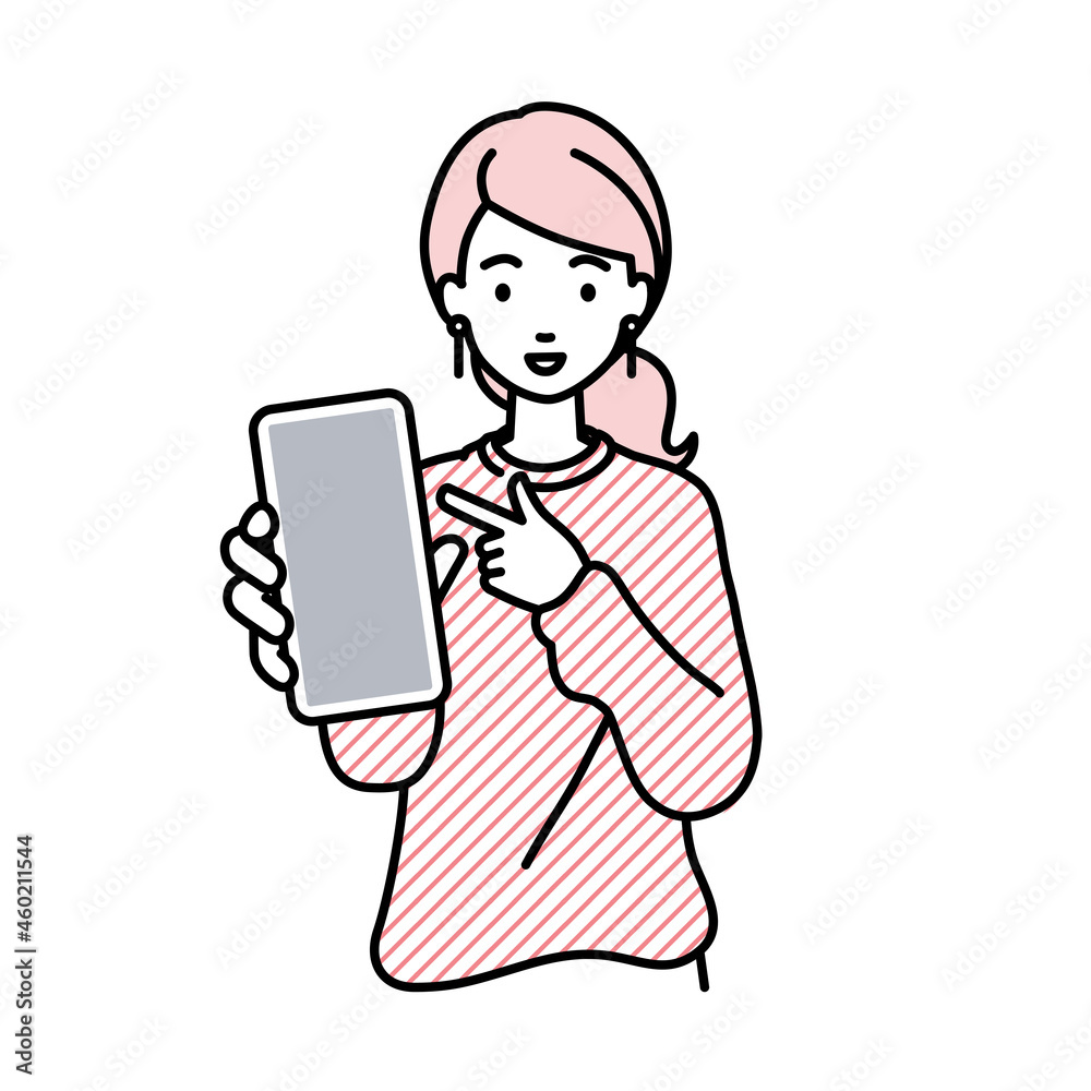 立ってスマートフォンを指差してこちらに向けて見せているリモートワークの女性 立ってスマートフォンを指差してこちらに向けて見せているリモートワークの女性