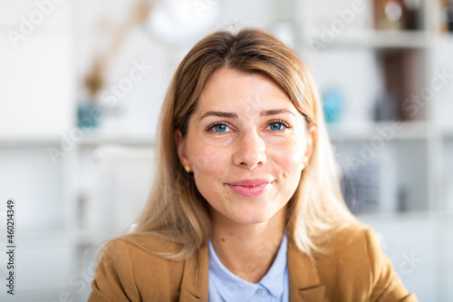 optimistic adult female person posing in white office Free Download optimistic adult female person posing in white office - GFXLoad