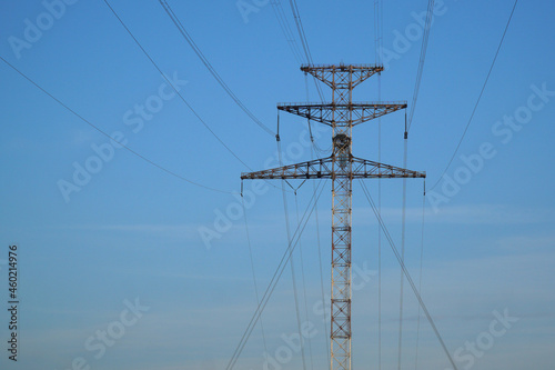  Power transmission towers against the blue sky.