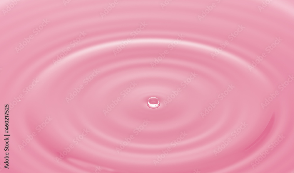 Water drop on water surface with pink light effects background. Water drop on water surface with pink light effects background.