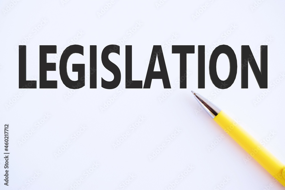 The word legislation against pencil, business concept The word legislation against pencil, business concept