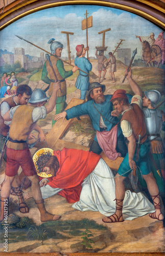 VIENNA, AUSTIRA - JUNI 17, 2021: The painting of Fall of Jesus under the cross as part of Cross way stations in church Marienkirche by redemptorist Maximilian Schmalzl from end of 19. cent. © Renáta Sedmáková