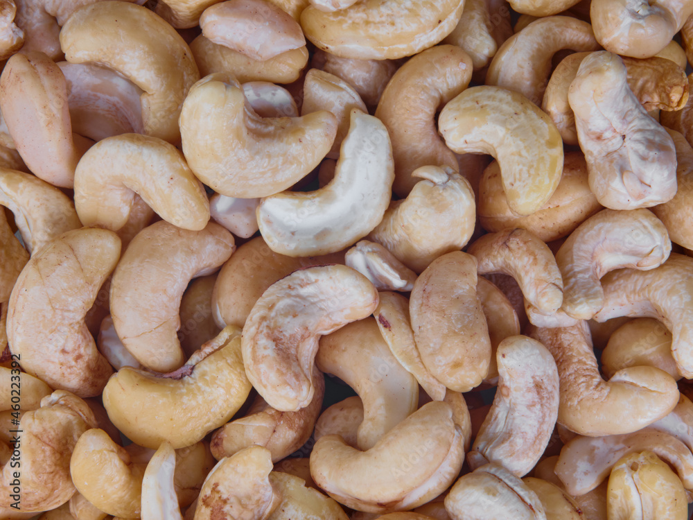 pile of cashew nuts background. Detail pile of cashew nuts background. Detail
