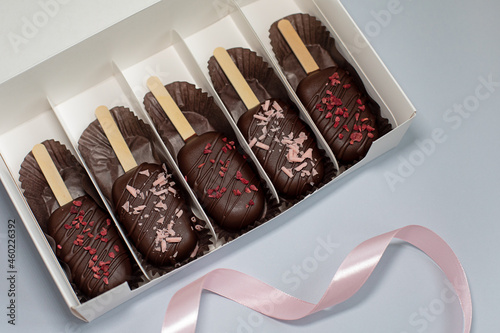 Ice cream popsicle cake in box. Sweets birthday party. Concept food, baking, holidays
