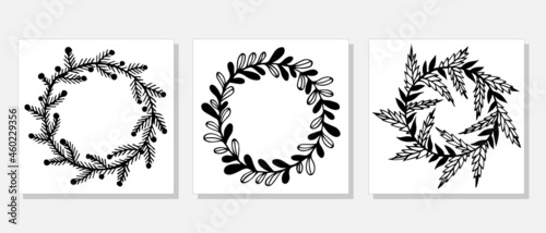 Festive wreaths from branches and herbs vector set. Hand-drawn doodles isolated on white background. Garlands with twigs, leaves, thorns, berries, holly. Monochrome botanical elements.