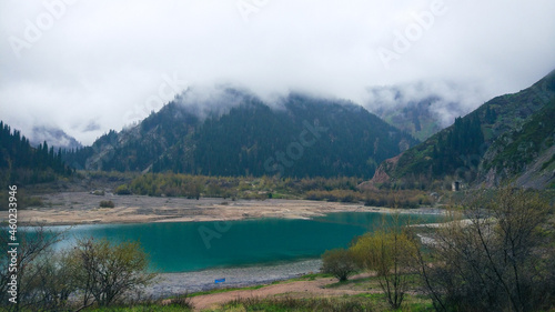 Misty lake in the mountains of Kazakhstan