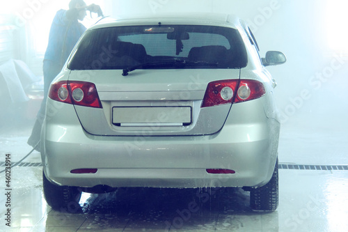 Russia, Moscow, December 11, 2011: The car in the foam at the car wash box gets a full body cleaning. © Александра Замулина