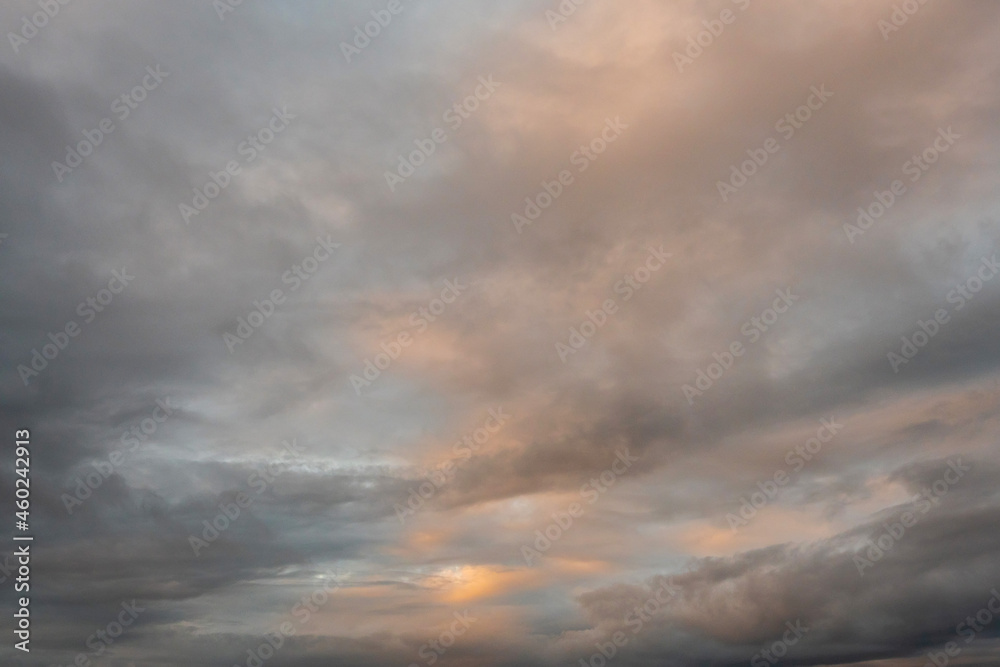 Beautiful clouds at sunrise. Light pastel colors. Nature background.