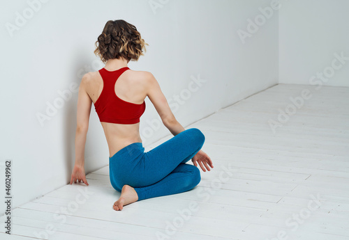 woman in sports uniform workout stretch fitness slim figure