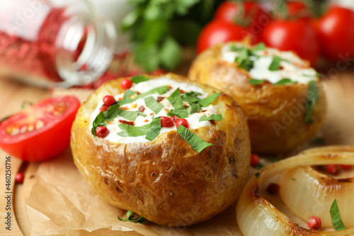 Concept of tasty food with baked potato, close up