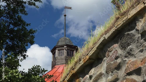 A view of Priozersk Karelia Fortress Korela made of Stonewall, against the blue sky, Panorama stronghold Korela, Medieval fortress in Priozersk, Sights of Russia. photo