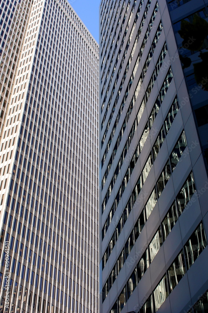 Two skyscrapers side by side in the form of a book. Architecture. abstraction Two skyscrapers side by side in the form of a book. Architecture. abstraction