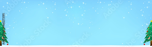 クリスマスツリーとキラキラした雪の降る背景（ワイドサイズ）