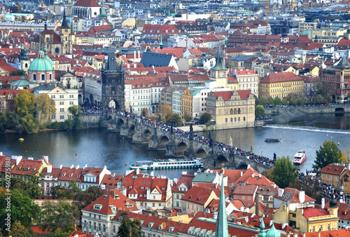 Prague, Czech Republic - Aerial view of Charles Bridge, Karlův most, over the river Vltava, full of tourists, in the Prague Old Town, Staré Město. A UNESCO World Heritage Site.