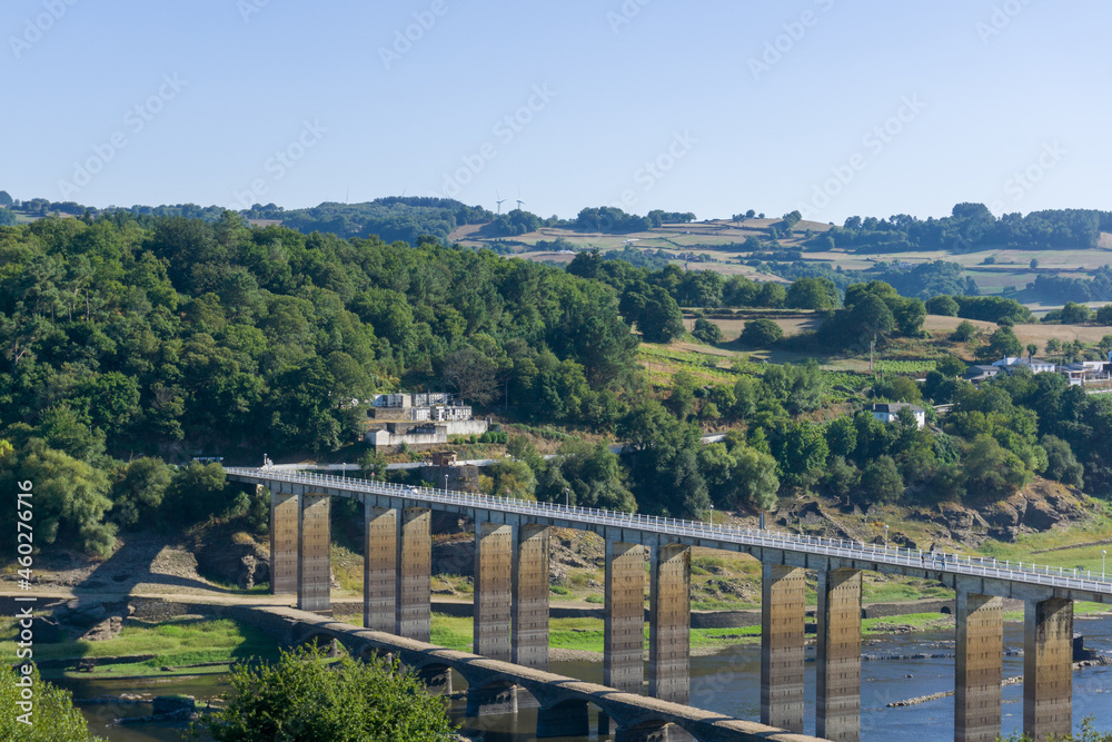 Fototapeta premium New bridge over the river in Portomarín, Lugo, in The Way