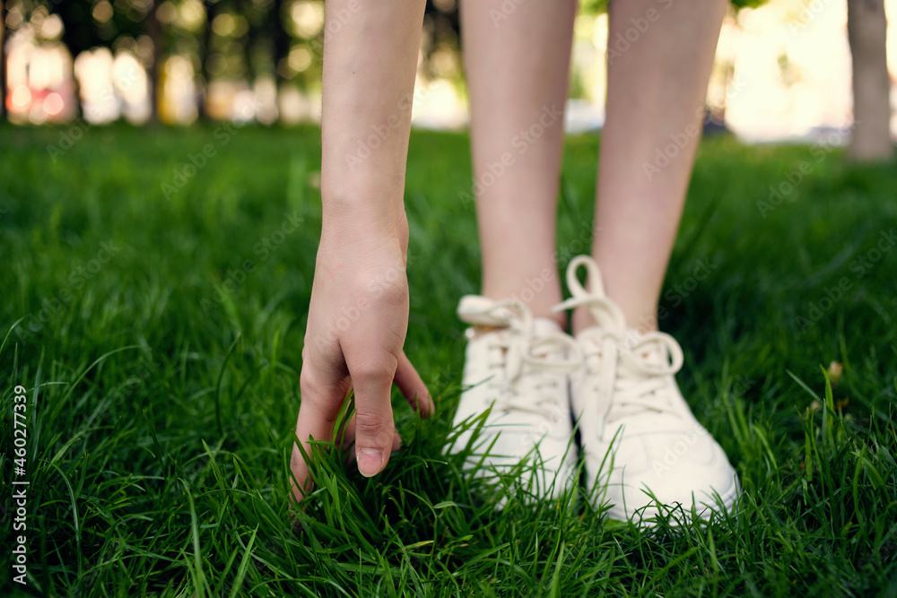 female feet grass park fresh air walk