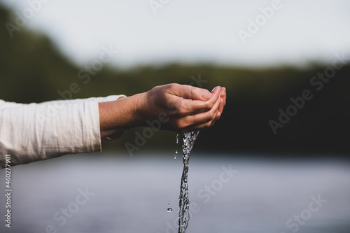 River Water falling through hands