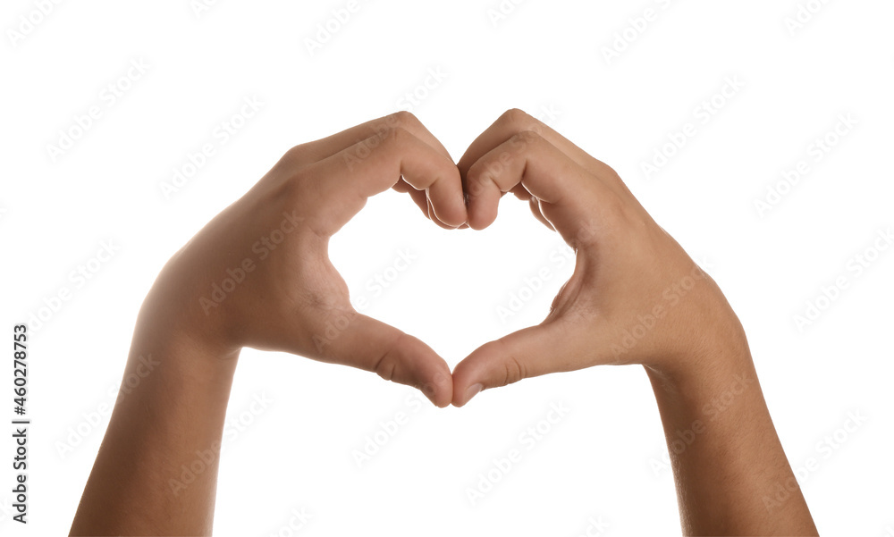 Teenage boy showing heart with hands on white background, closeup Teenage boy showing heart with hands on white background, closeup