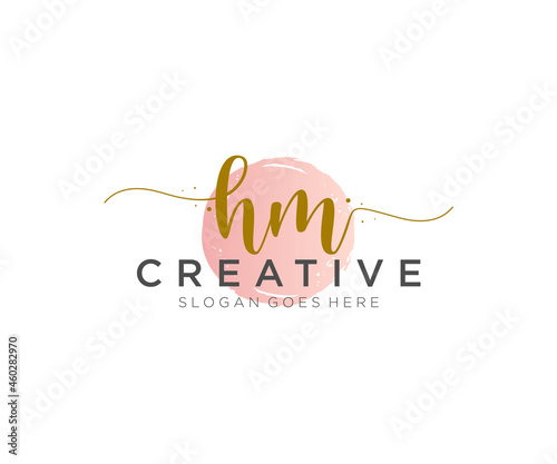 initial HM Feminine logo beauty monogram and elegant logo design, handwriting logo of initial signature, wedding, fashion, floral and botanical with creative template.