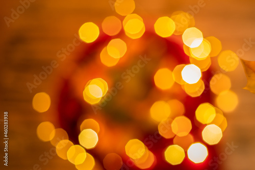 defocused garland for christmas and various holidays in red and orange © Lena_Fotostocker