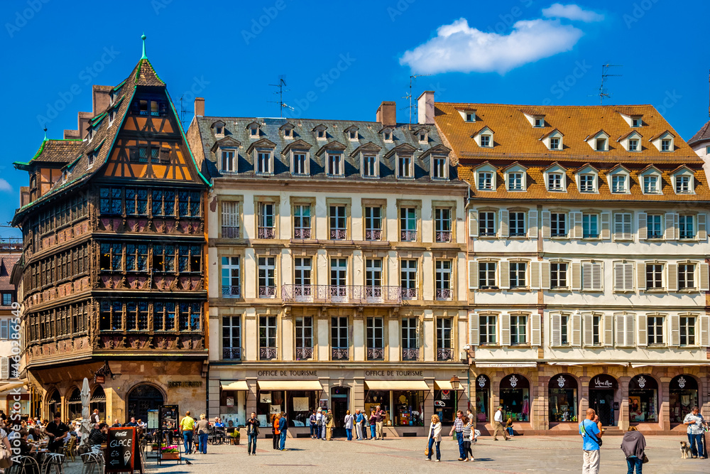 Nice view of a row of buildings on the Place de la Cathédrale in Strasbourg including the famous Kammerzell House, one of the most ornate and well preserved medieval house in late Gothic architecture.