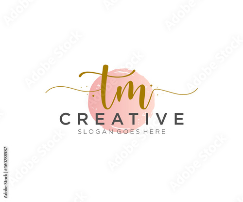 initial TM Feminine logo beauty monogram and elegant logo design, handwriting logo of initial signature, wedding, fashion, floral and botanical with creative template.