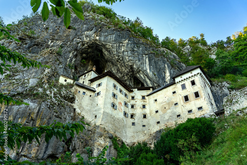 predjama castle built into a mountain in the nature near to postojna cave photo