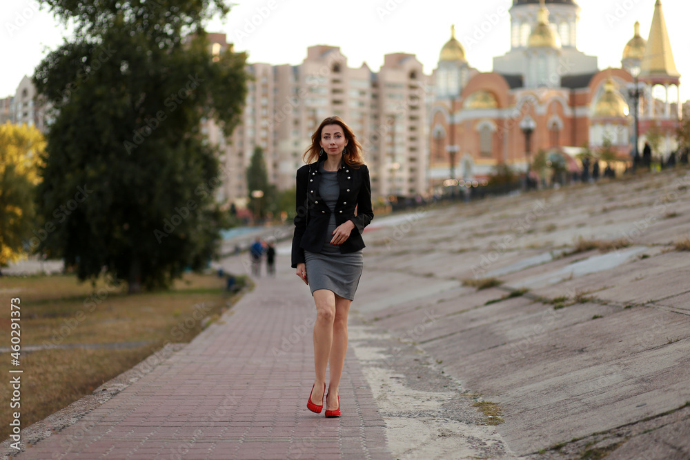 Businesswoman walking in the street