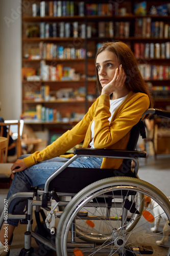 Thoughtful disabled female student in wheelchair