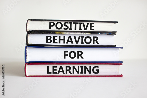Positive behavior for learning symbol. Concept words Positive behavior for learning on books on a beautiful white background. Business, positive behavior for learning concept. Copy space.