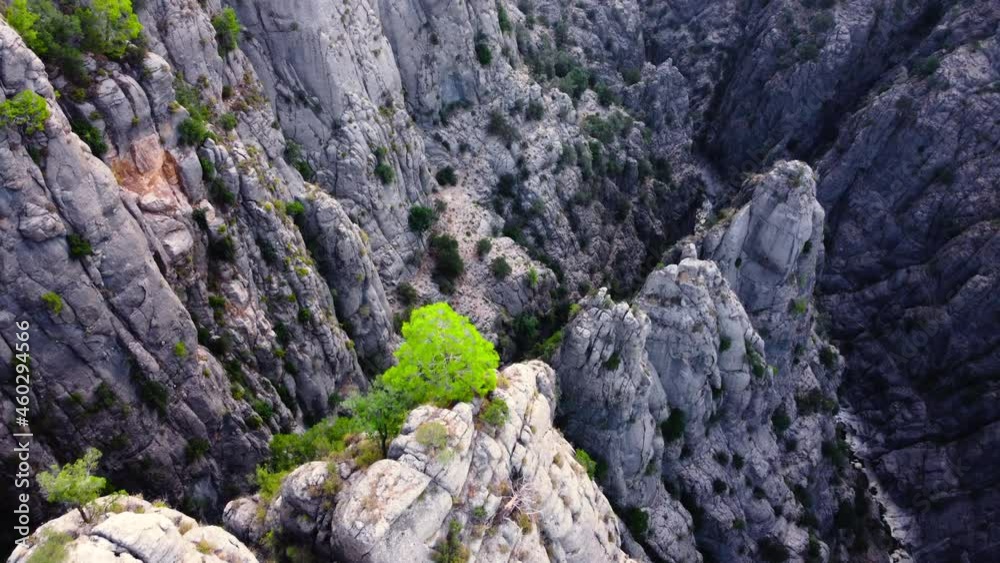 Huge Spectacular Rocks, epic aerial drone flight over famous Mountains Valley, Huge stone structures, Dramatic geological wonder with green Trees. Birds eye view landscape 4k Huge Spectacular Rocks, epic aerial drone flight over famous Mountains Valley, Huge stone structures, Dramatic geological wonder with green Trees. Birds eye view landscape 4k
