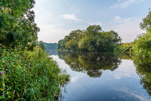 A view of reflections in the River Tees at Yarm, Yorkshire, UK in summertime