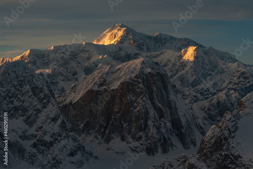 Denali shines in sunset light with Mt. Barille in front