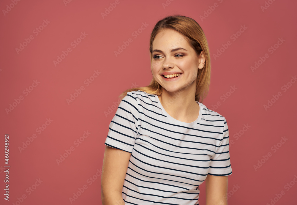 cute blonde girl in striped t-shirt emotions posing studio pink background cute blonde girl in striped t-shirt emotions posing studio pink background