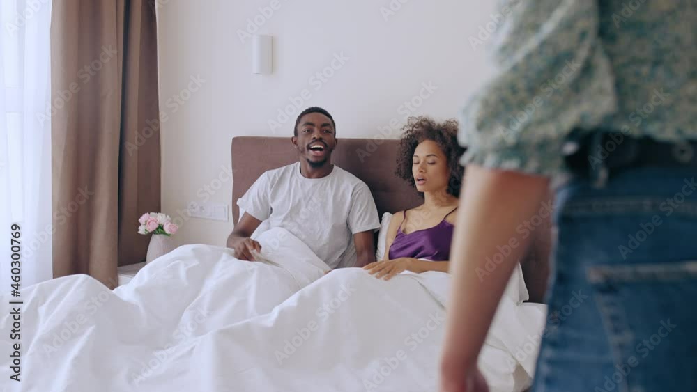 Wife catching husband with mistress in bed, marriage breakdown, cheating problem
