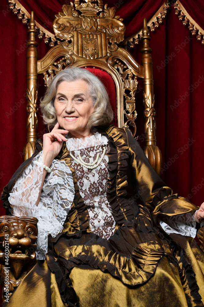 Obraz premium Portrait of beautiful senior queen on throne