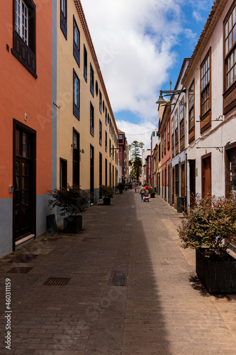 Fototapeta Naklejka Na Ścianę i Meble -  San Cristobal de La Laguna, Tenerife, Canary Islands, Spain: Beautiful narrow street with old house in the city centre. La Laguna is a tourist attraction with a picturesque old town.
