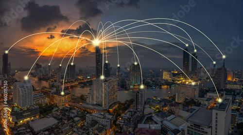 Computer Network connection line between building over Panorama of Bangkok cityscape river side Modern building at Fantastic twilight time, Connectivity and global networks concept