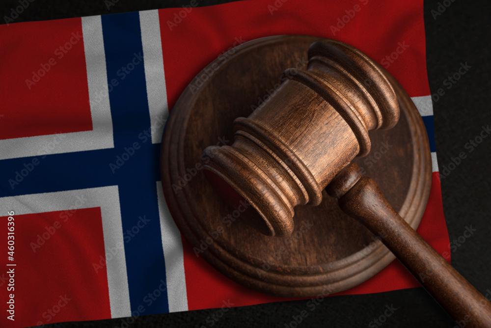 Judge Gavel and flag of Norway. Law and justice in Kingdom of Norway. Violation of rights and freedoms