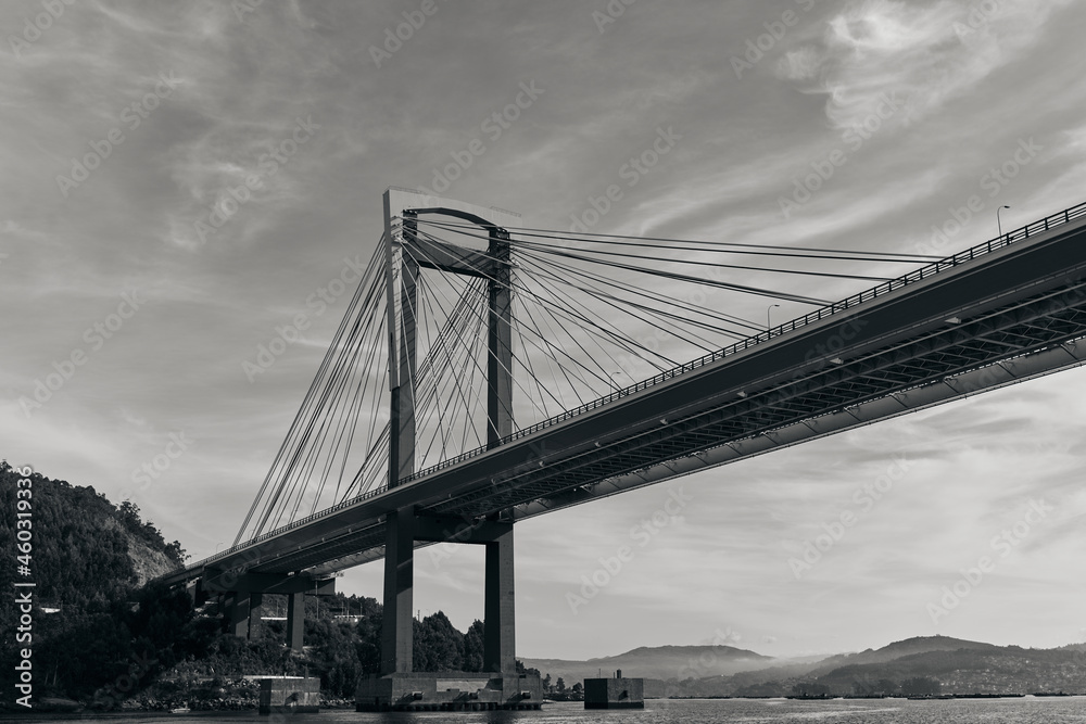 Bridge of Rande in Vigo, Spain, black and white image taken from a boat on the sea