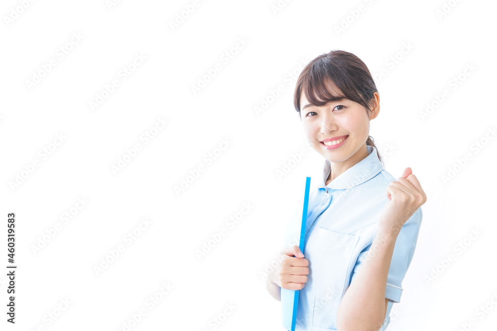 ガッツポーズをする看護師 ガッツポーズをする看護師